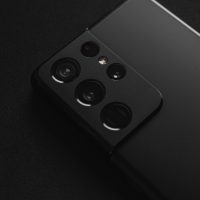black remote control on black textile