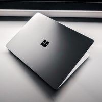 A laptop computer sitting on top of a table