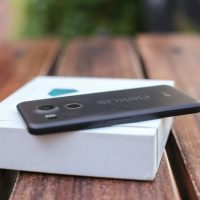 black iphone 7 box on white table