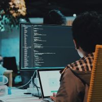 boy in front of computer monitor